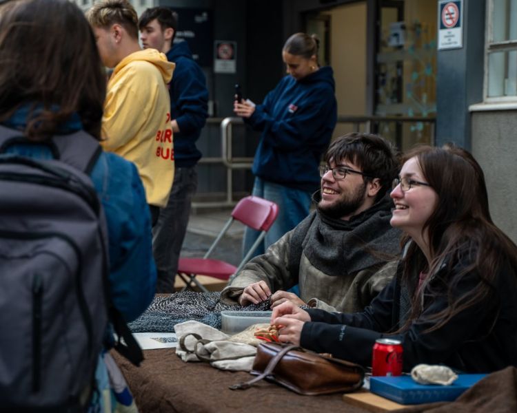 Two society members at stall on Richmond Street.