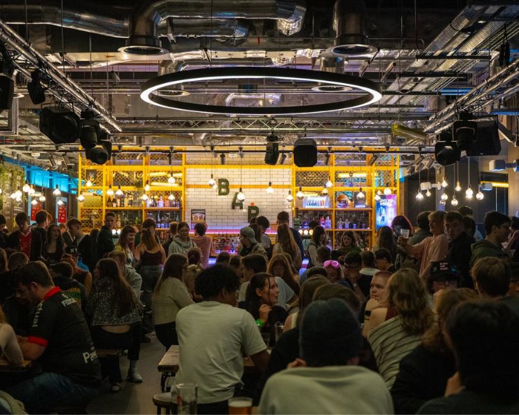 View across bar during night time event.