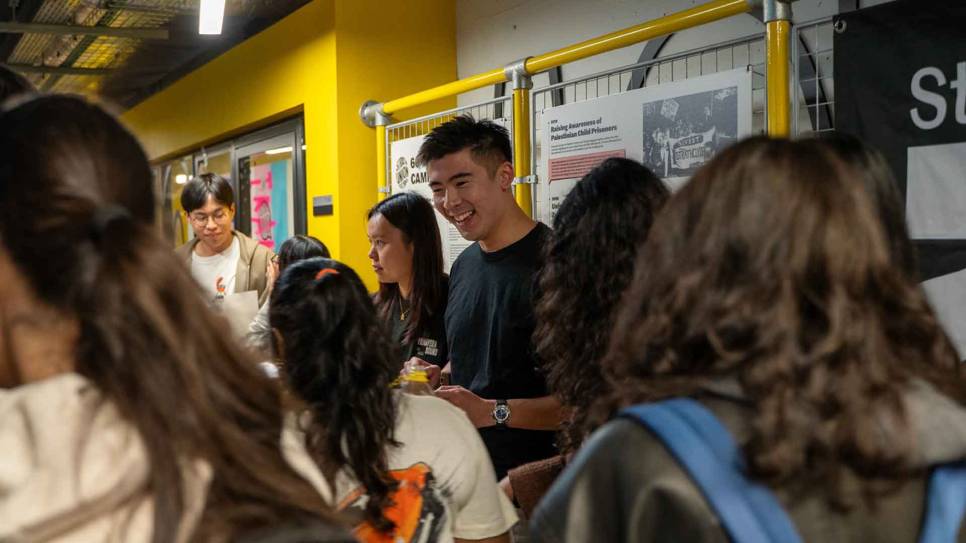 Students interacting in the Union building