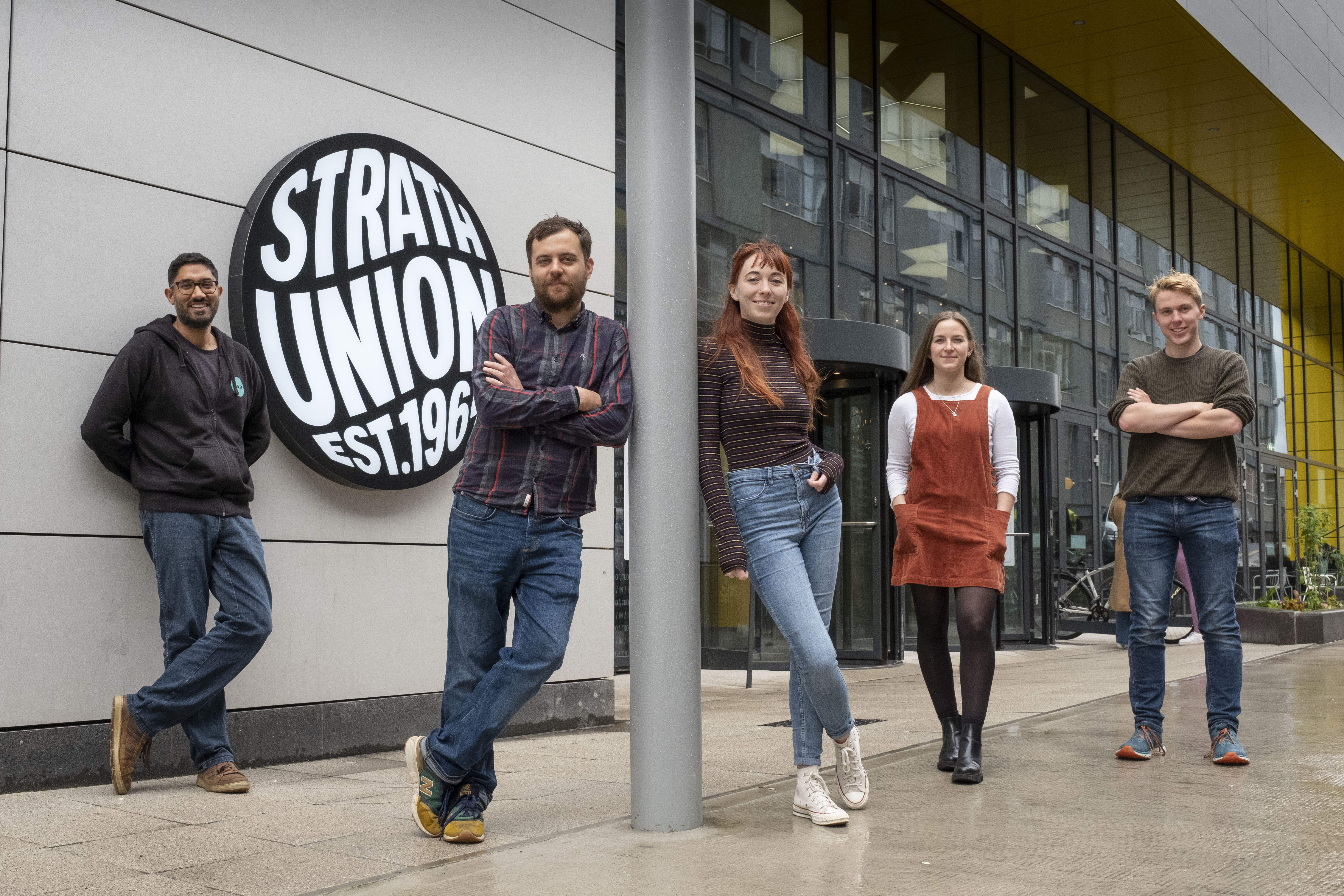 Manish Joshi, Graham Hogg, Sarah Wagner, Rachel Naysmith, Ru Wallace outside Strath Union building.