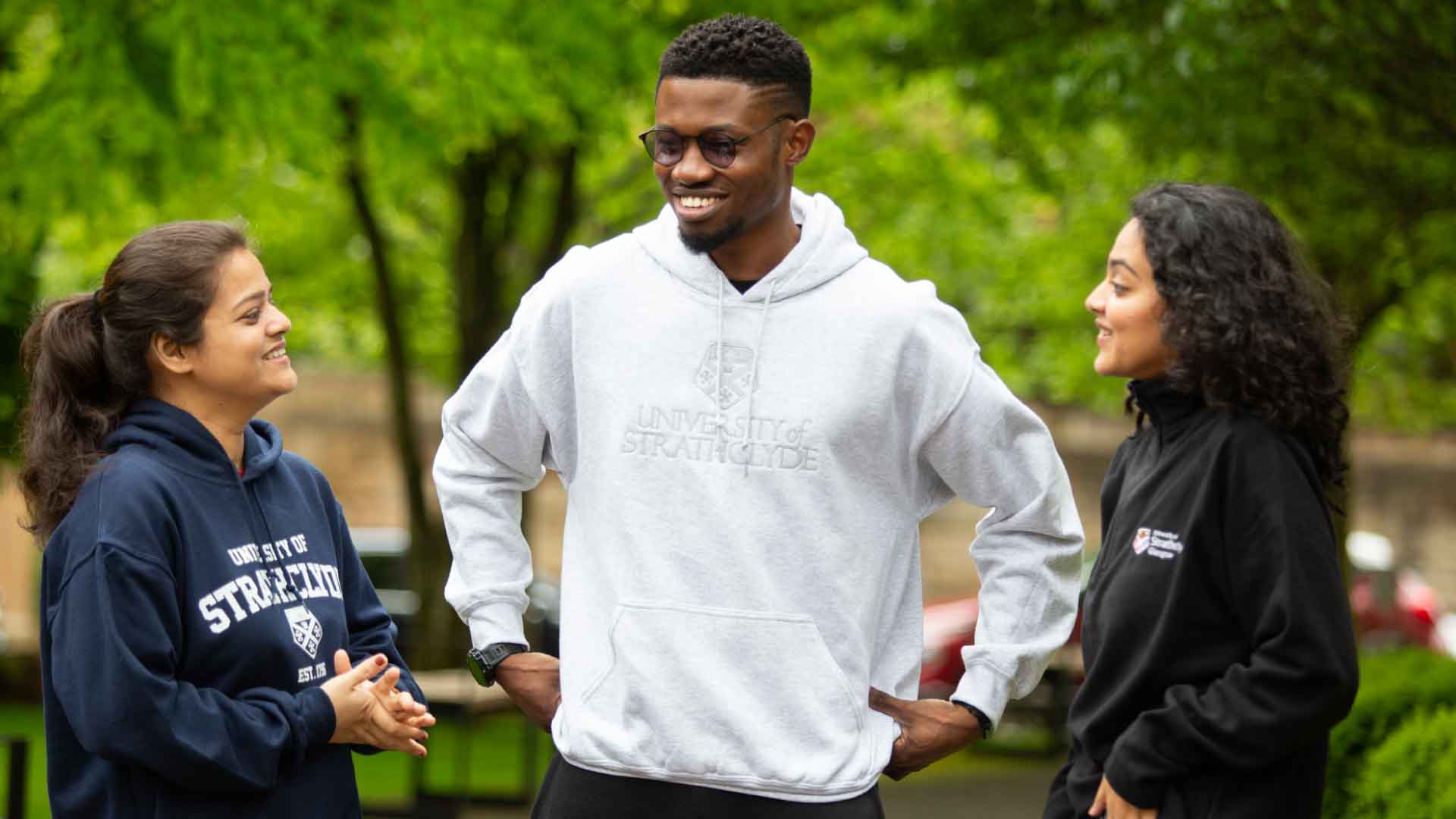 Group of students wearing Strathclyde branded merchandise.