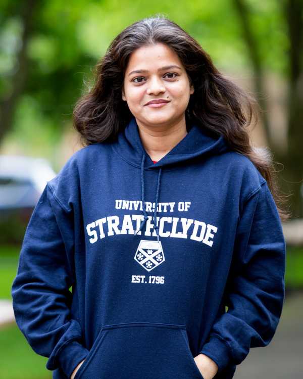 Student wearing navy Strathclyde merch hoodie