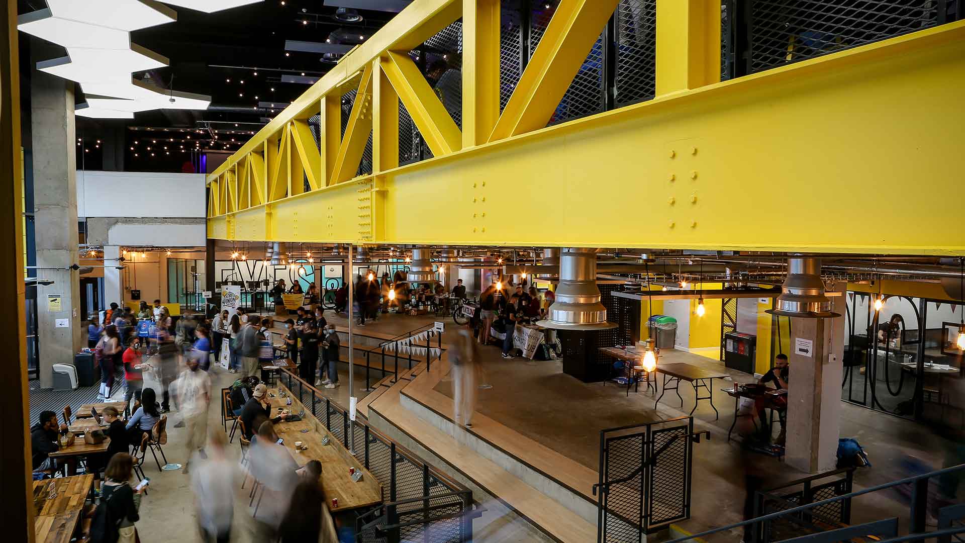 People moving around the Strath Union building