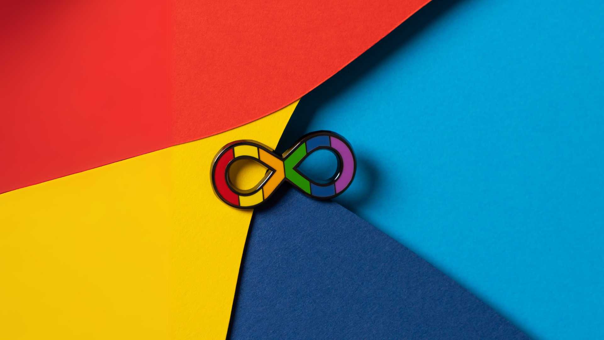 Infinity rainbow symbol on colourful background.