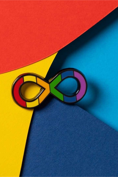 Infinity rainbow symbol on colourful background.