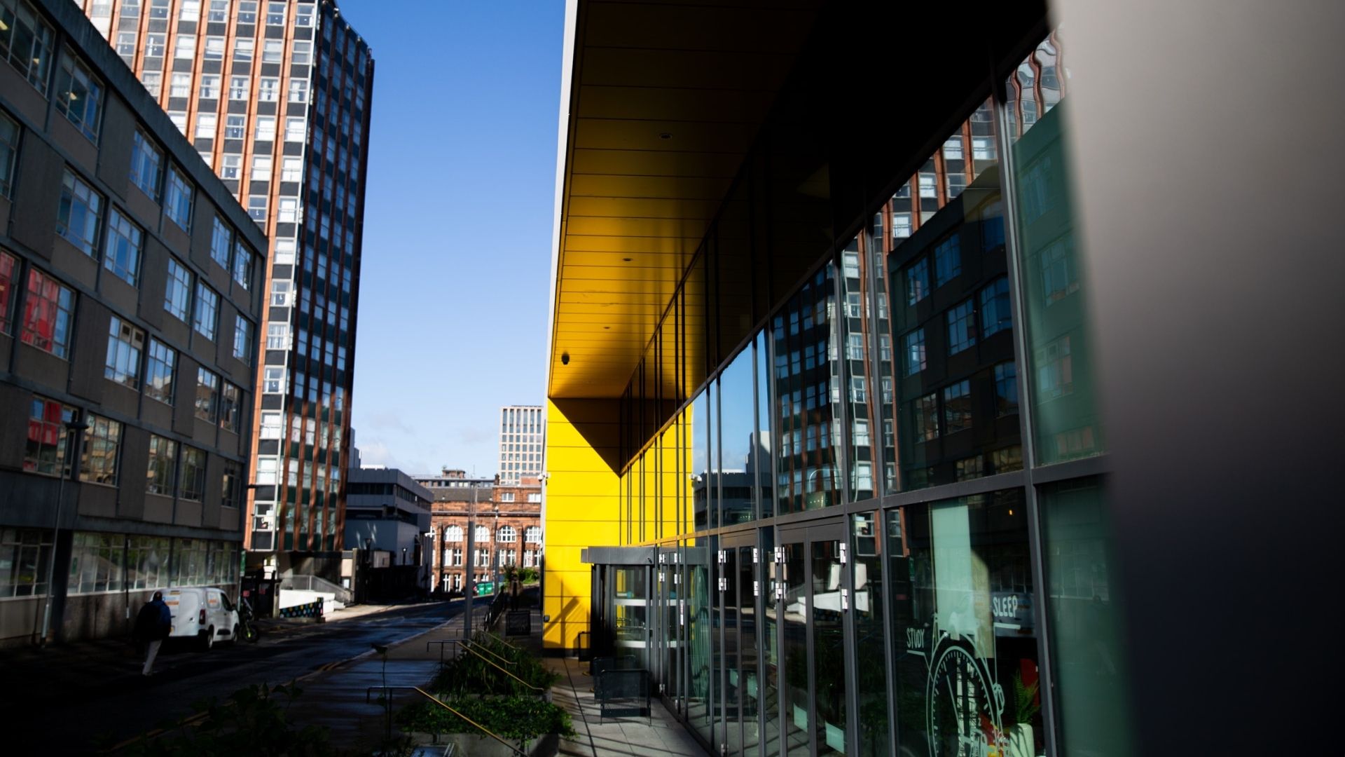Wide shot of the Union building including the corner of the Learning and Teaching building