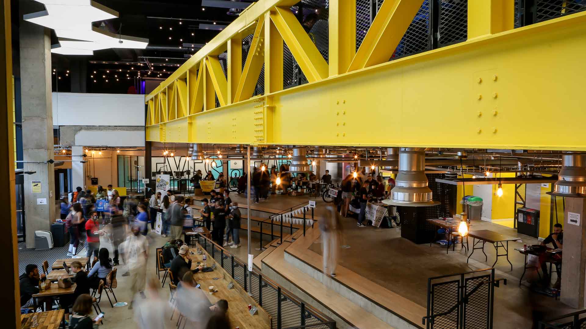 People moving around the Strath Union building