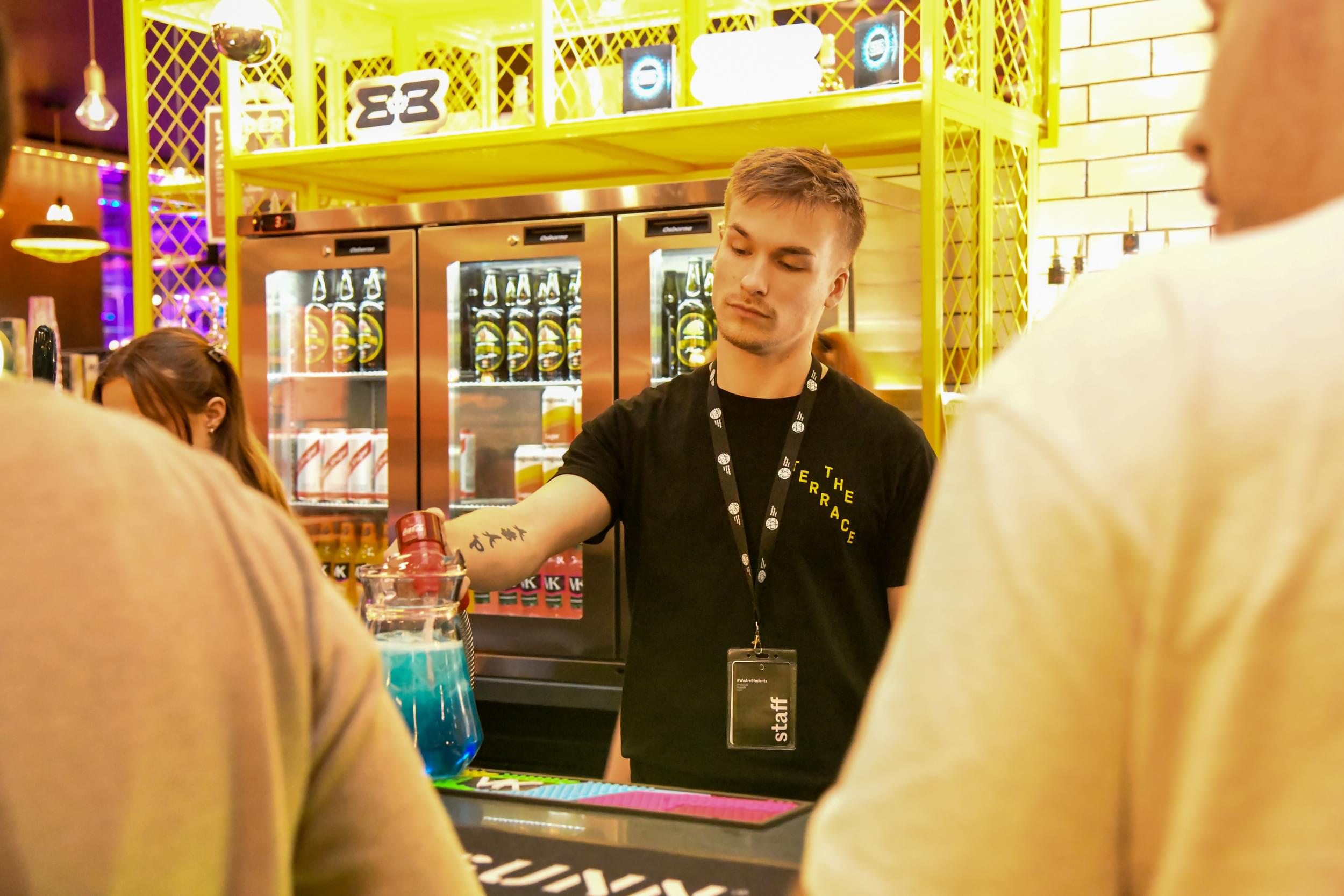 Terrace bartender serving drinks