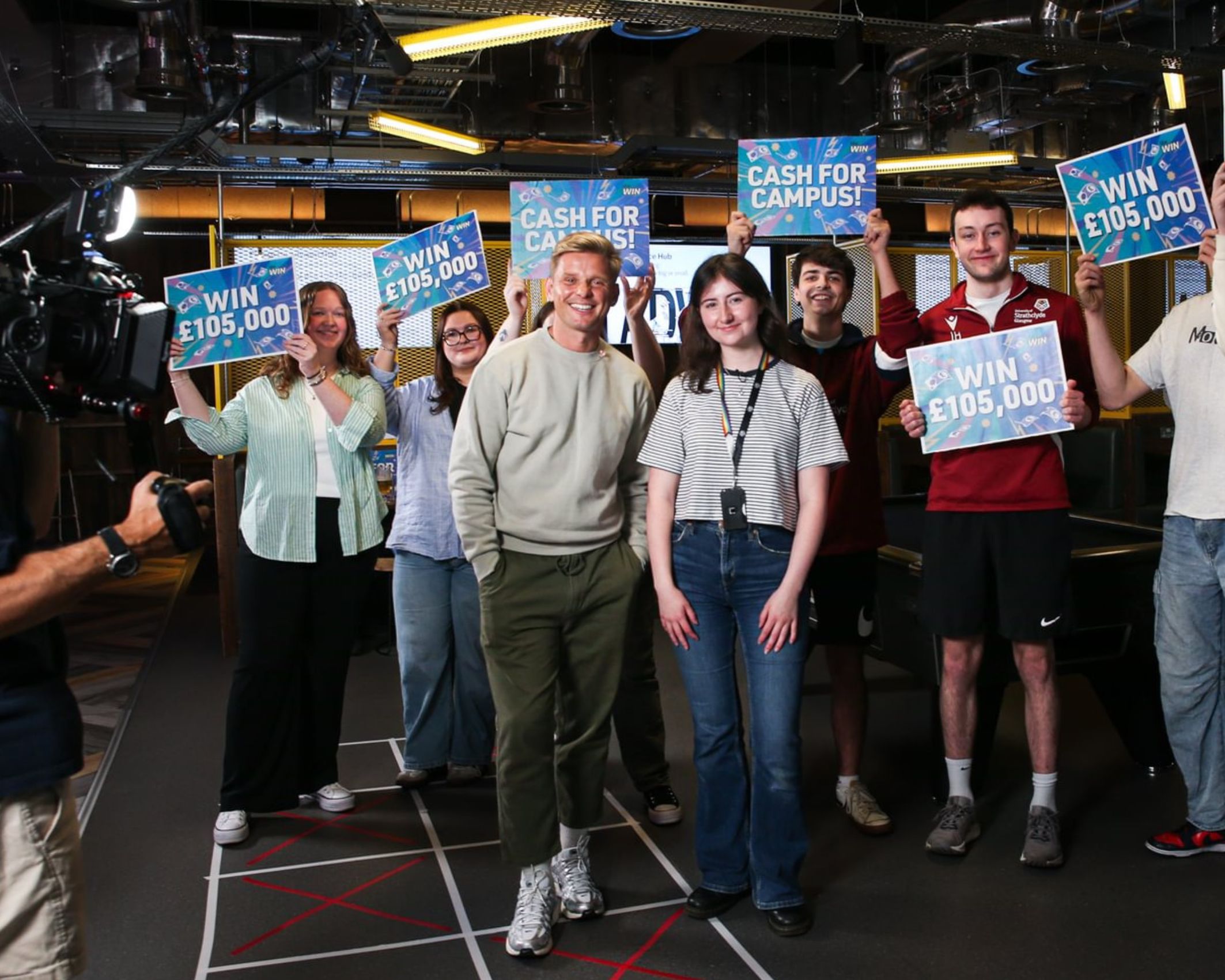 Students in the bar with Jeff Brazier for live tv segment recordings.