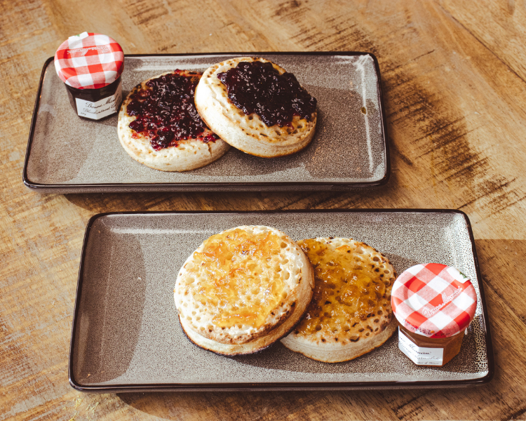 Crumpets with jam and marmalade