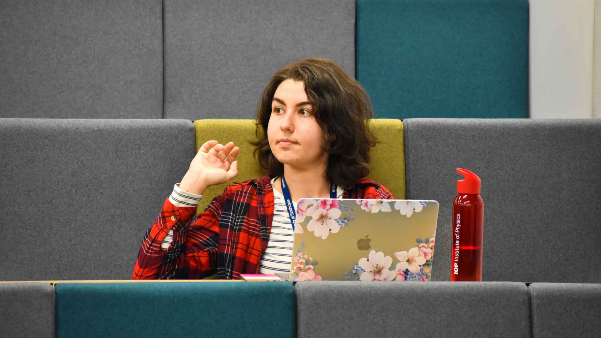 Student attending a Members' Meeting