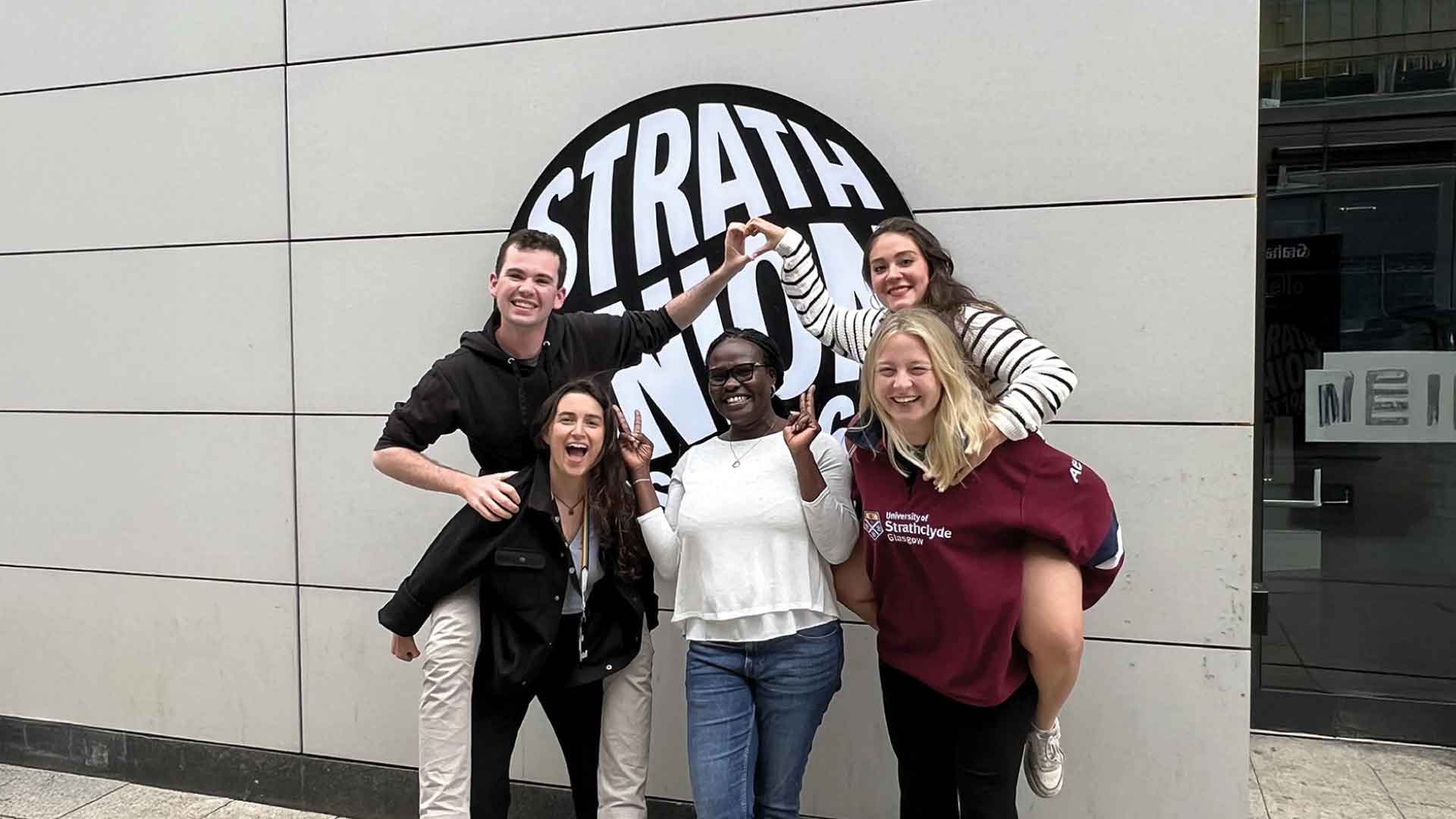 Strathclyde student officers smiling at the camera