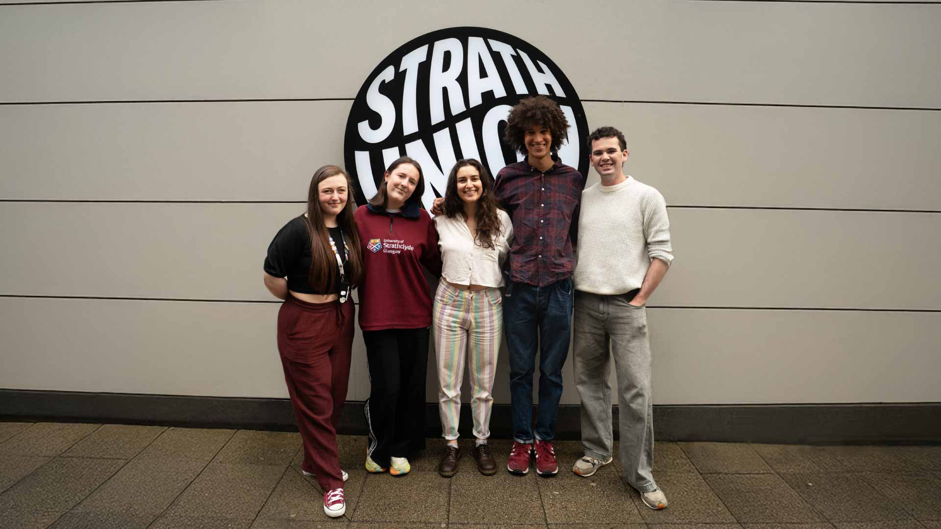 Strathclyde student officers smiling at the camera