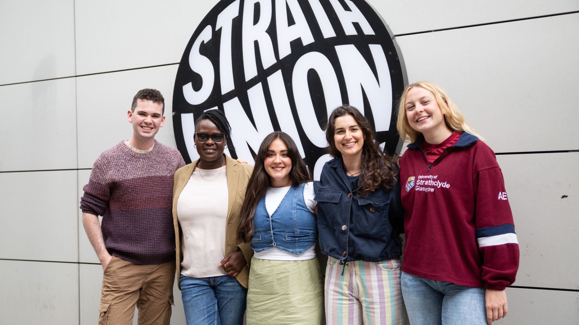 Strathclyde student officers smiling at the camera