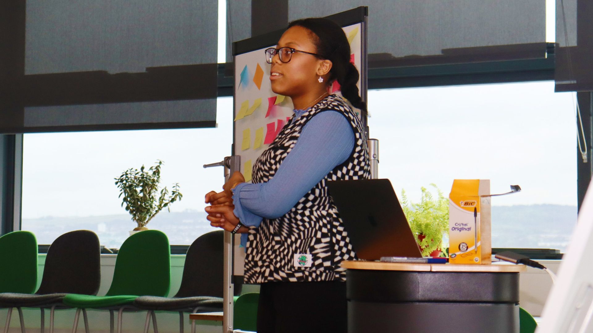 Students watching a Strath Union staff member giving a training presentation.
