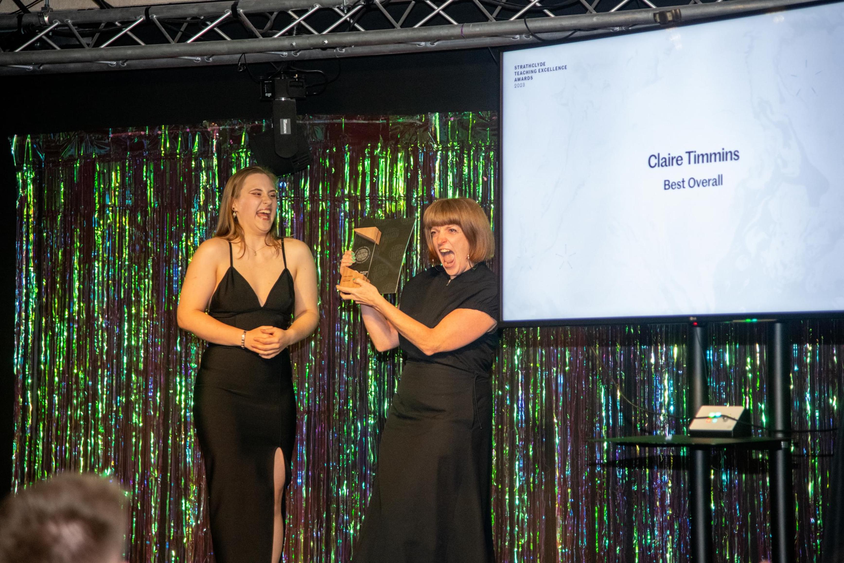 Award winner on stage at ceremony